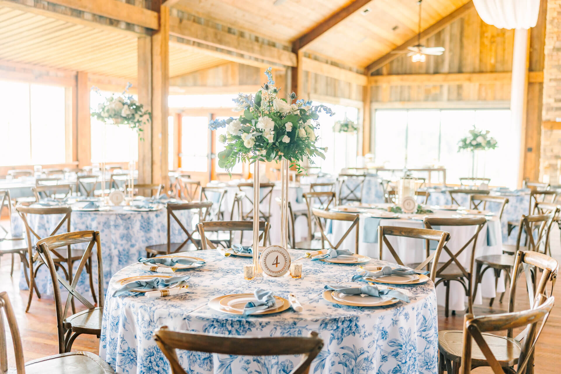 Items from Oakhaven's Decor Closet as part of a daytime wedding tablescape.
