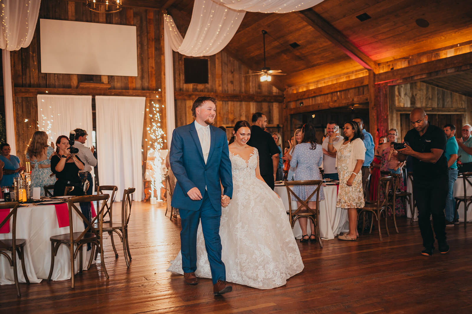 A newlywed couple makes an entrance at Oakhaven with Cold Sparks.