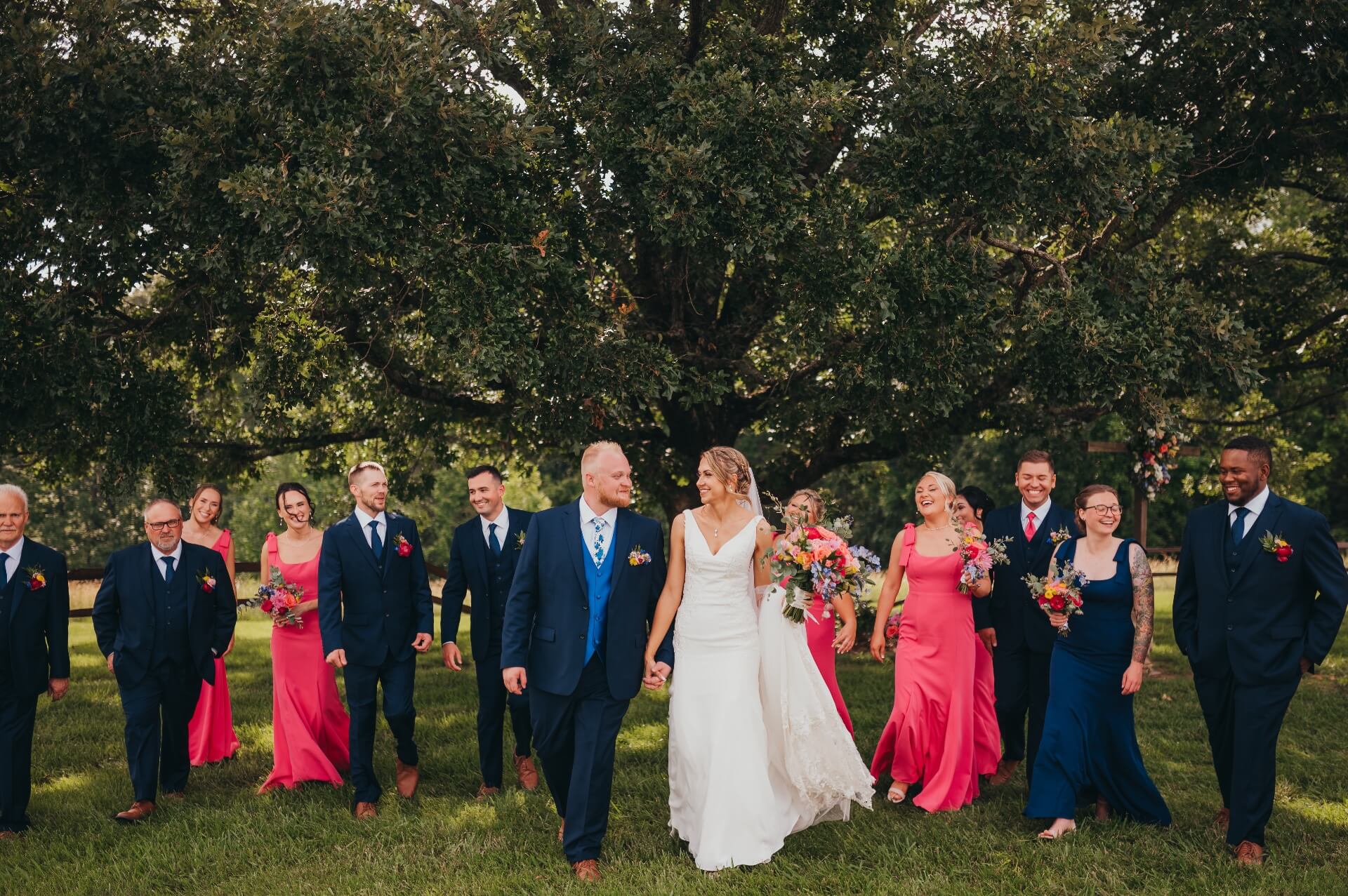A wedding party right after an outdoor ceremony. Photo by Lionel Faith Photograpy.
